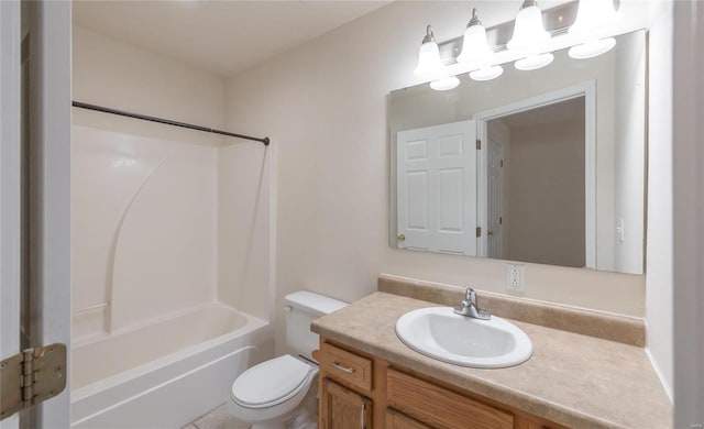 full bathroom featuring shower / bathtub combination, vanity, and toilet