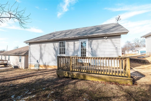 back of property featuring a deck