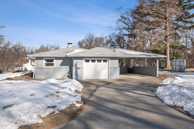 ranch-style home featuring a garage