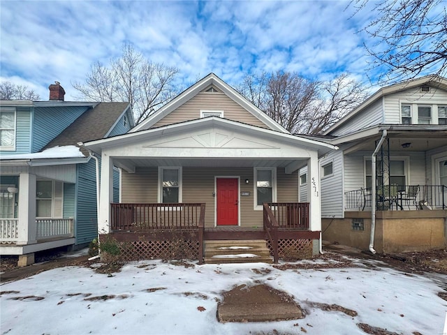 bungalow-style home featuring covered porch