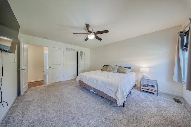 bedroom with ceiling fan and carpet