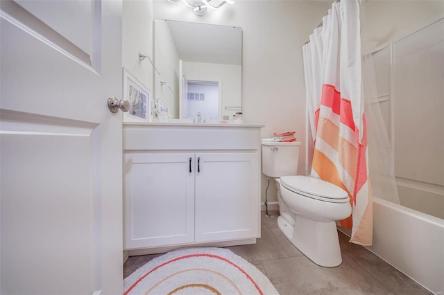 full bathroom with toilet, vanity, and shower / bath combo with shower curtain