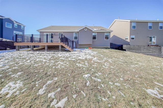 rear view of house with a deck