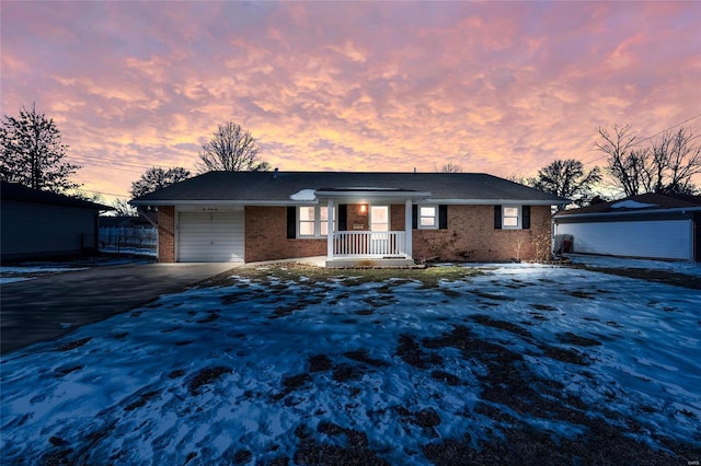 ranch-style home featuring a garage