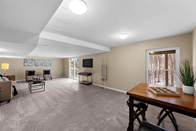 living area with carpet floors and baseboards