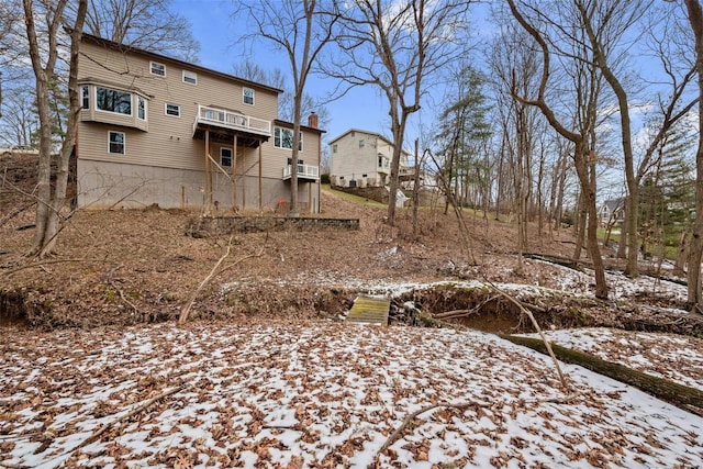 view of snow covered house