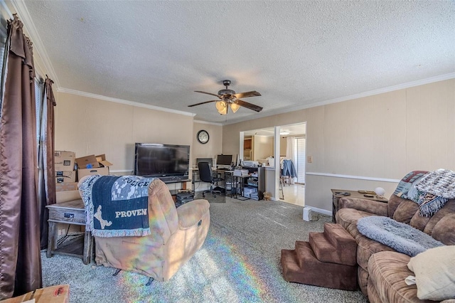 carpeted living room featuring ceiling fan, a textured ceiling, and crown molding