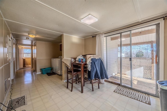 dining area with washer and dryer