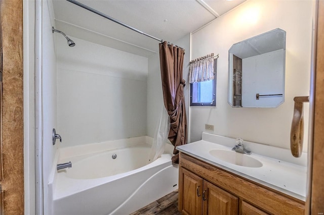 bathroom featuring vanity and shower / bath combo