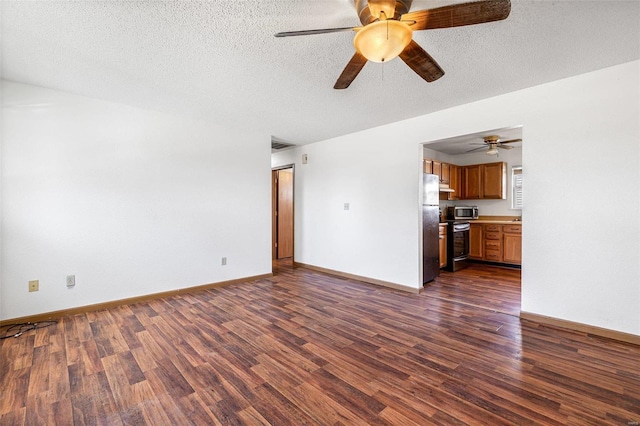 unfurnished living room with dark hardwood / wood-style floors and a textured ceiling