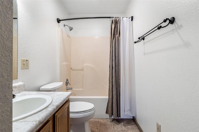 full bathroom with vanity, toilet, tile patterned flooring, and shower / bath combo with shower curtain