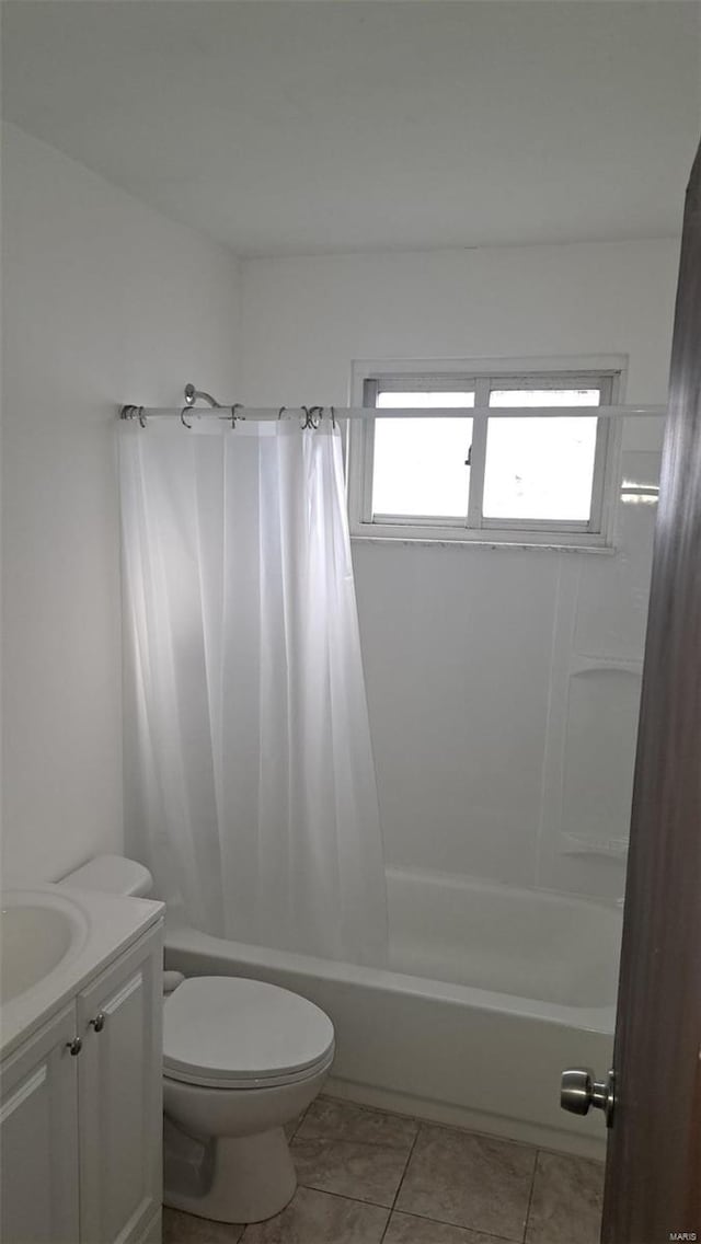 full bathroom with tile patterned flooring, vanity, shower / bath combination with curtain, and toilet