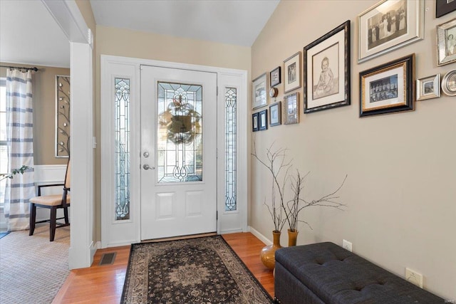 entrance foyer featuring hardwood / wood-style flooring