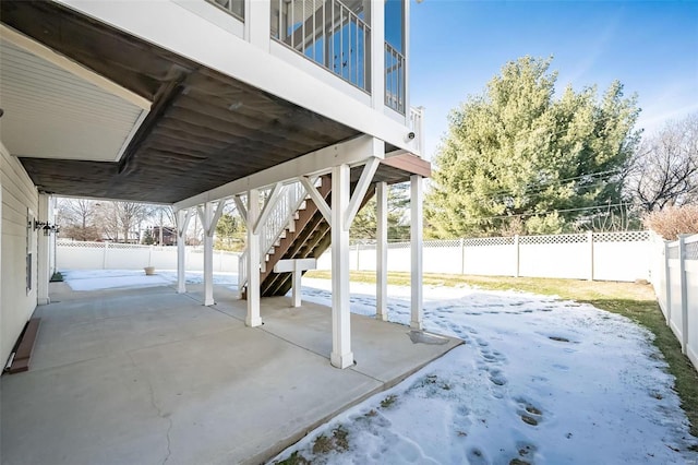 view of snow covered patio