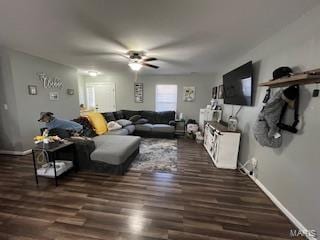 living room with dark hardwood / wood-style floors and ceiling fan