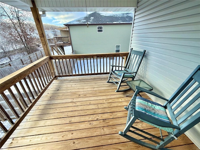 wooden terrace with fence