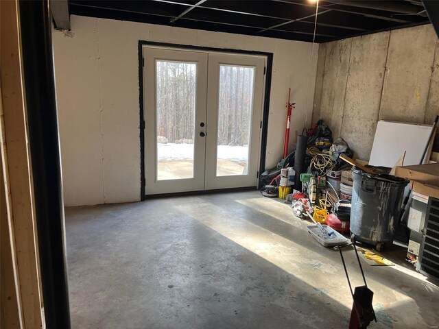 interior space featuring concrete floors and french doors