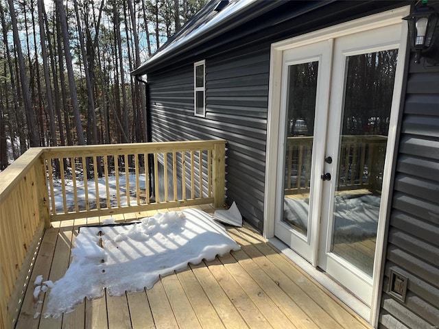 view of snow covered deck