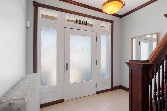 entrance foyer with stairs, crown molding, french doors, and baseboards