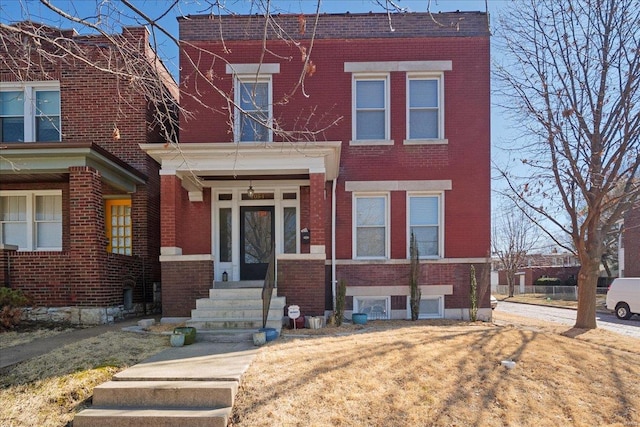 view of front of property with brick siding