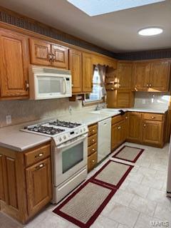 kitchen featuring white appliances