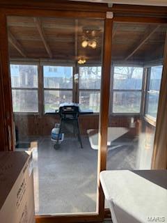 sunroom / solarium with wooden ceiling