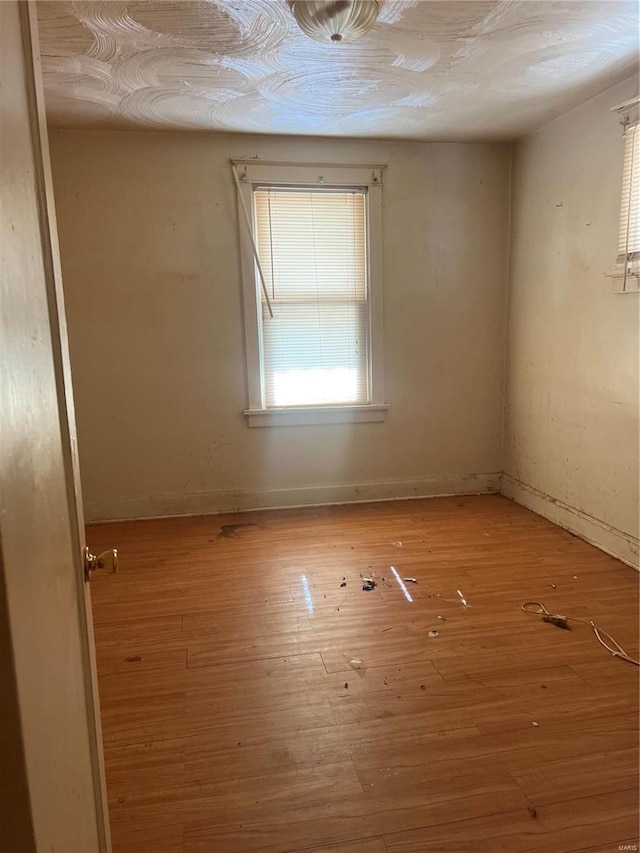 empty room with light wood-type flooring