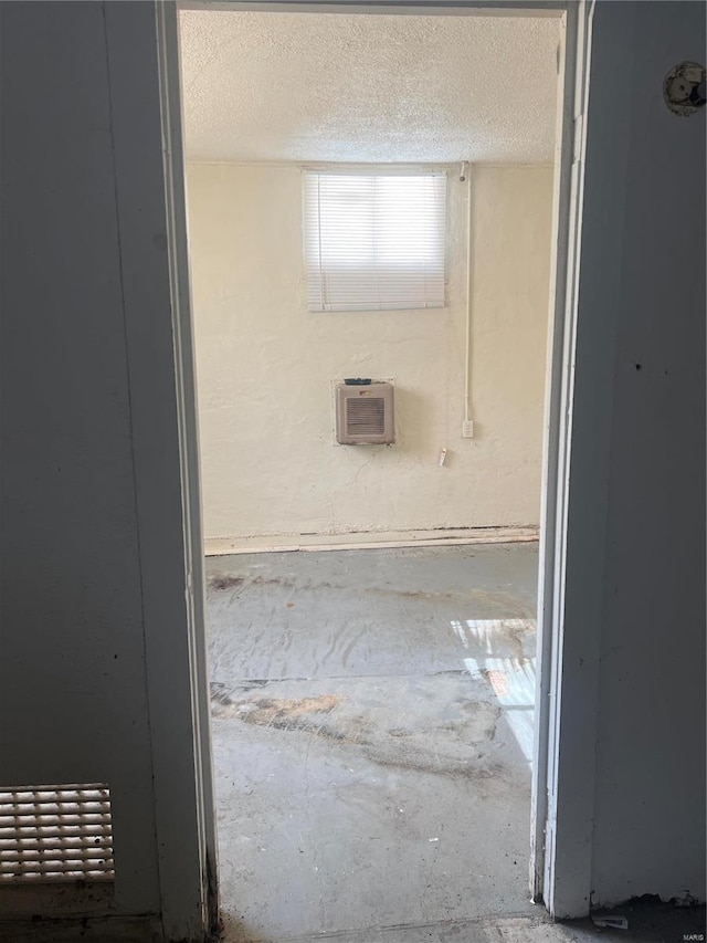 bathroom with a textured ceiling