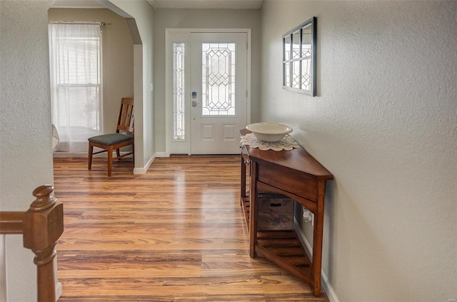 foyer with light hardwood / wood-style flooring