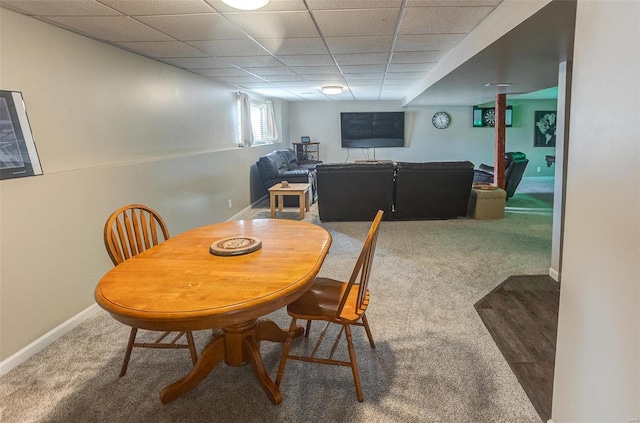 view of carpeted dining space