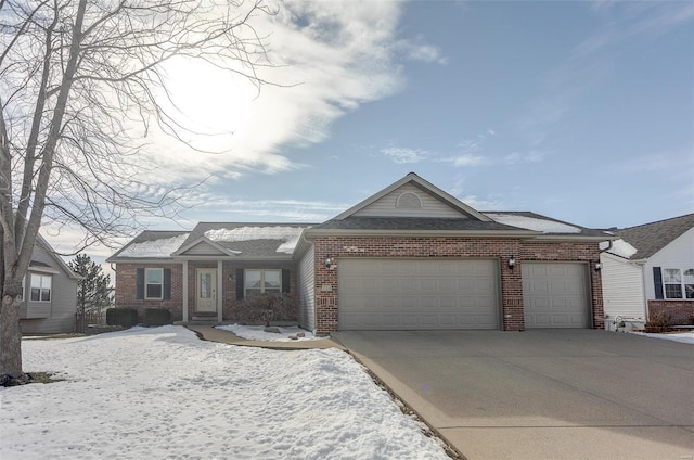 ranch-style house featuring a garage