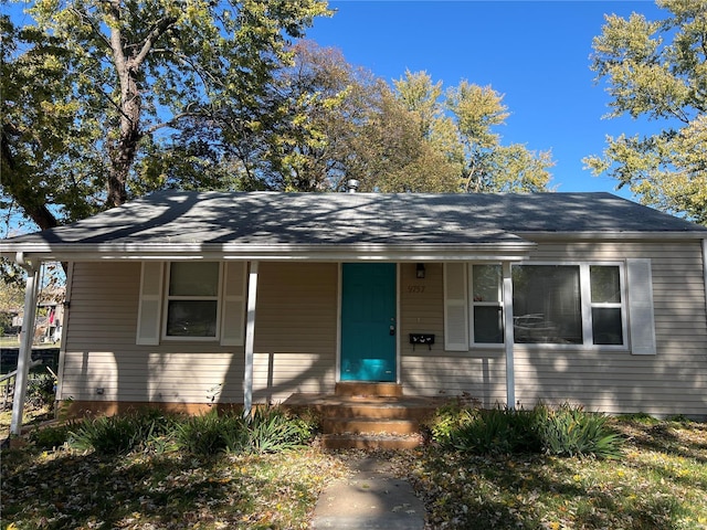 ranch-style house featuring a porch