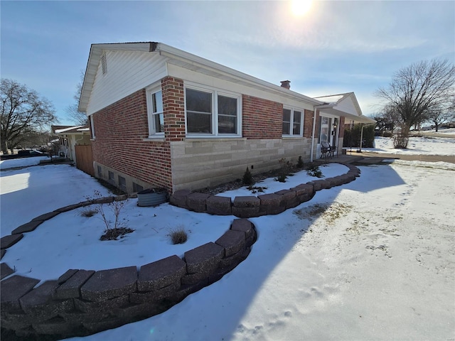 view of snow covered property