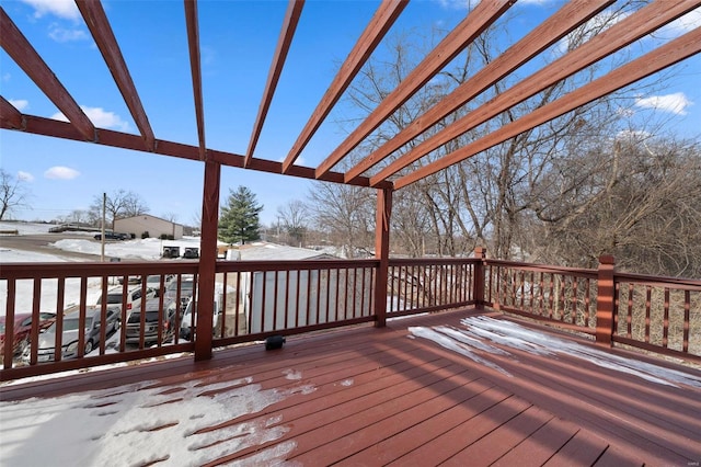 view of snow covered deck