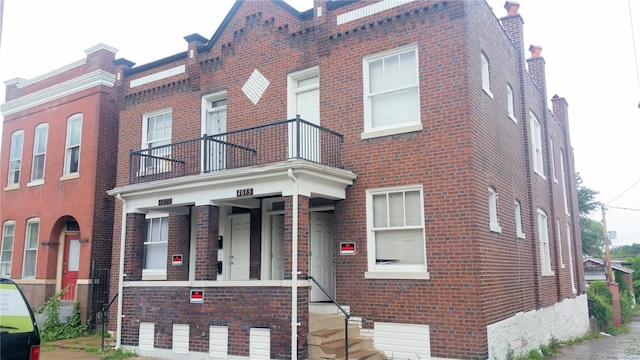 view of property featuring a balcony