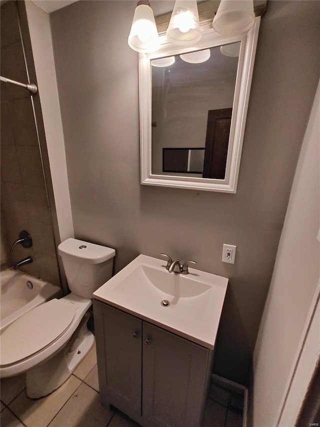 full bathroom with vanity, tub / shower combination, tile patterned floors, and toilet