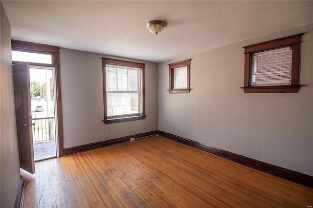 spare room with light wood-type flooring