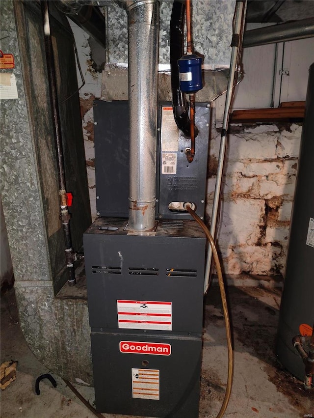 utilities featuring heating unit and gas water heater