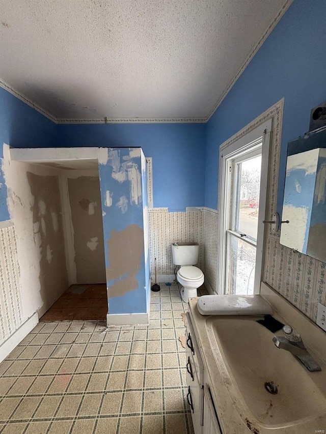 bathroom with sink and a textured ceiling