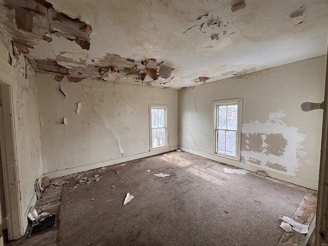 empty room with carpet flooring