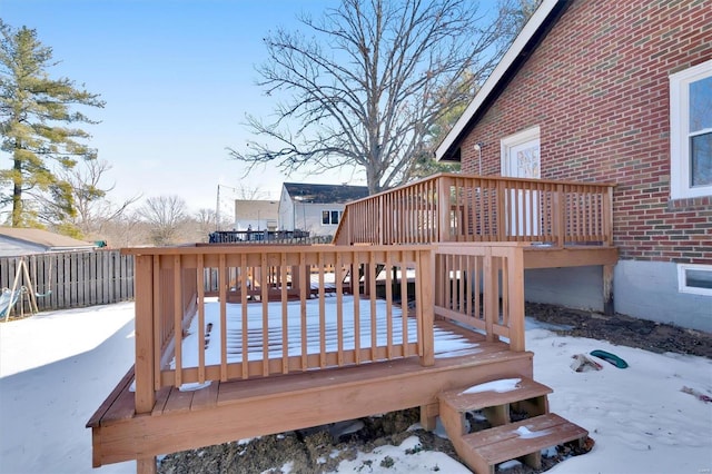 view of snow covered deck