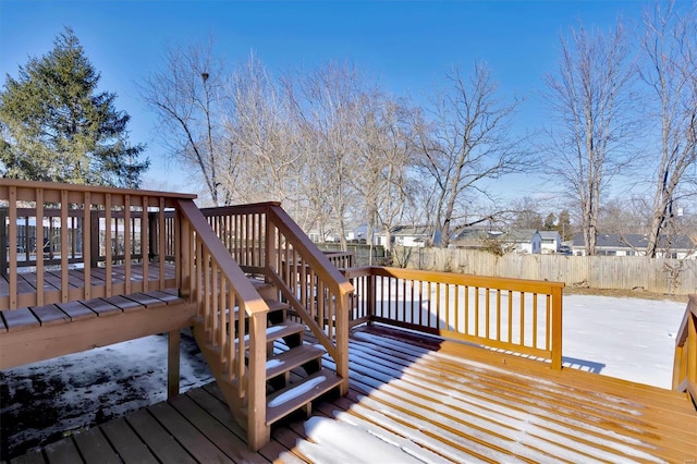 view of snow covered deck