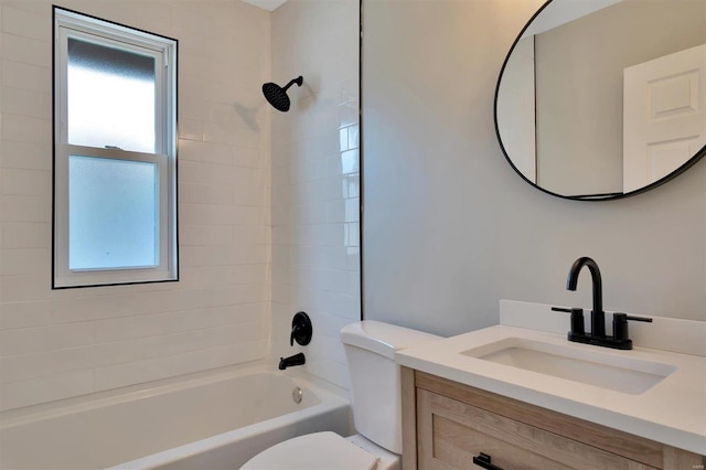 full bathroom with vanity, bathtub / shower combination, and toilet