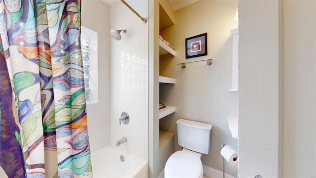 bathroom featuring shower / bathtub combination with curtain and toilet