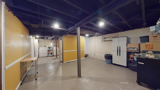 basement featuring separate washer and dryer