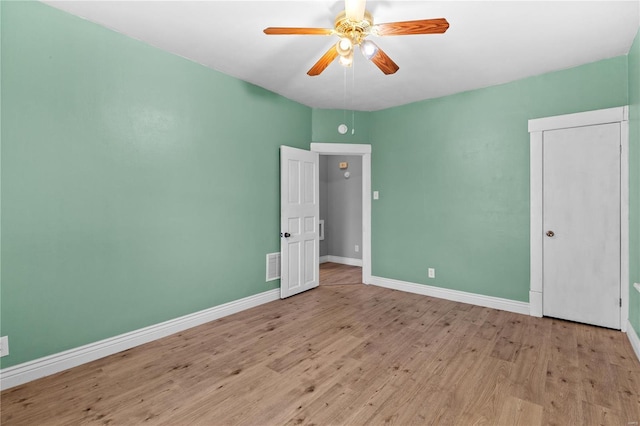 unfurnished bedroom featuring ceiling fan and light hardwood / wood-style floors