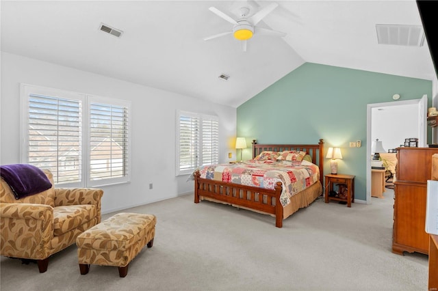 bedroom with lofted ceiling, light colored carpet, and ceiling fan