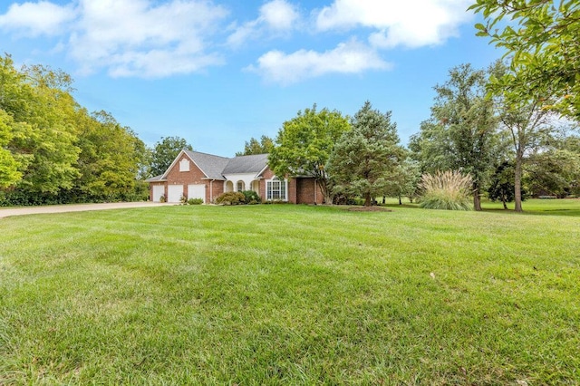 view of yard featuring a garage