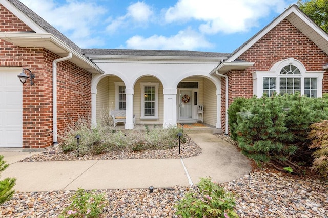 entrance to property with a porch