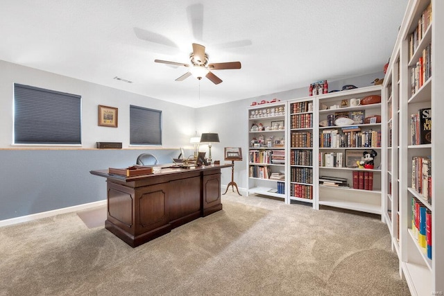 office space featuring ceiling fan and carpet flooring